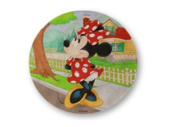Minnie pöttyös ruhában tortaostya