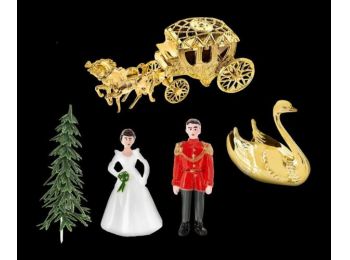 Hercegi pár arany hintóval műanyag tortadísz