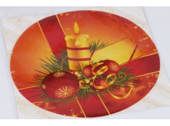 Gyertyával díszített masni karácsonyi tortaostya