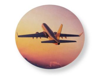 Repülőgép naplementében tortaostya